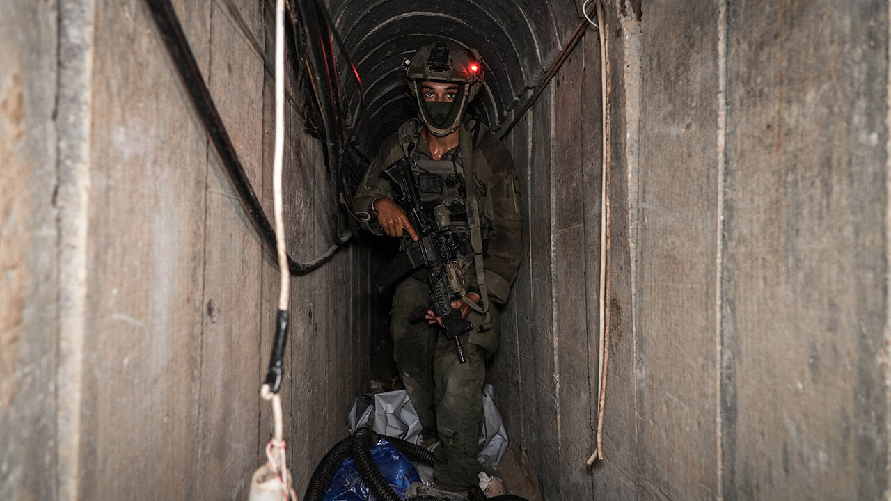 An Israeli soldier walks through a tunnel at the European Hospital in Khan Yunis in the Gaza Strip, June 8th 2025