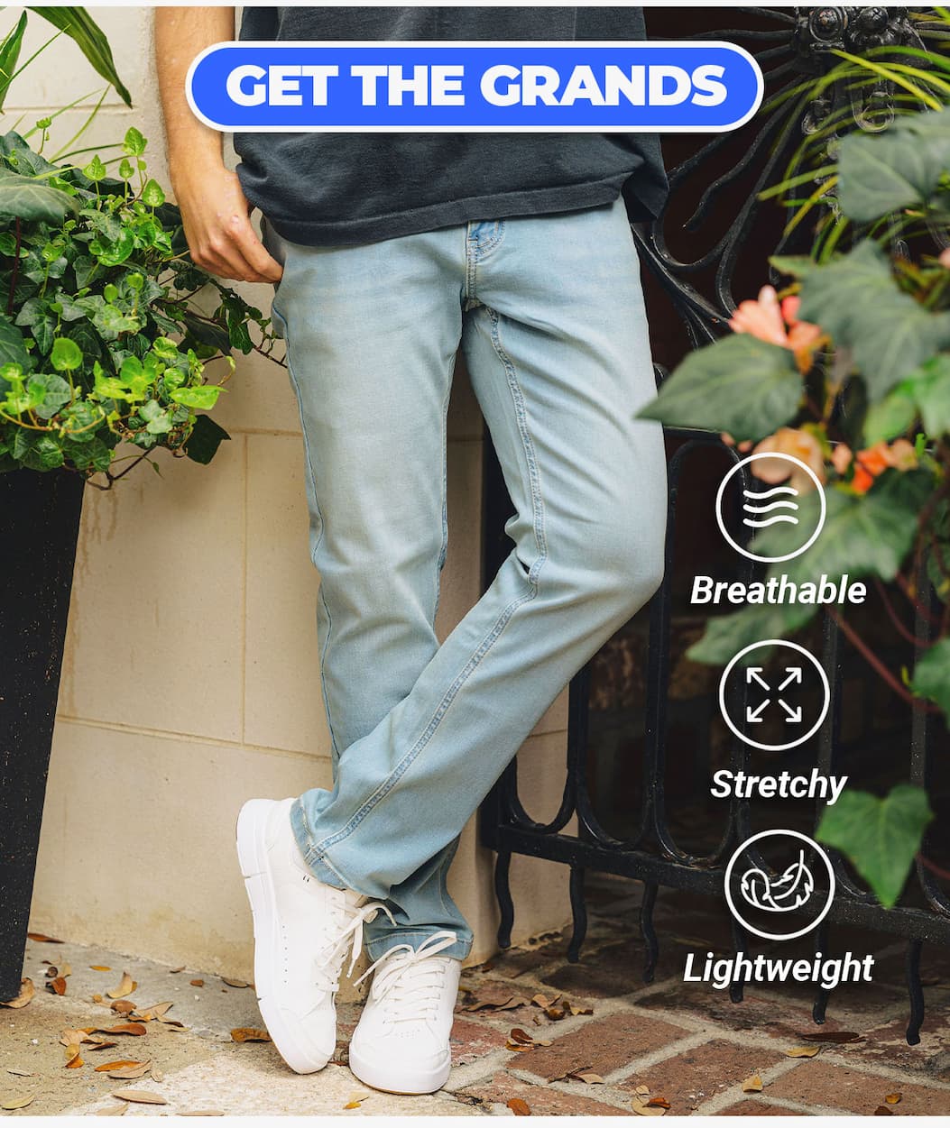 Guy wearing The grand light blue jeans on a nice spring day outside. Button to shop. Breathable, stretchy, lightweight.