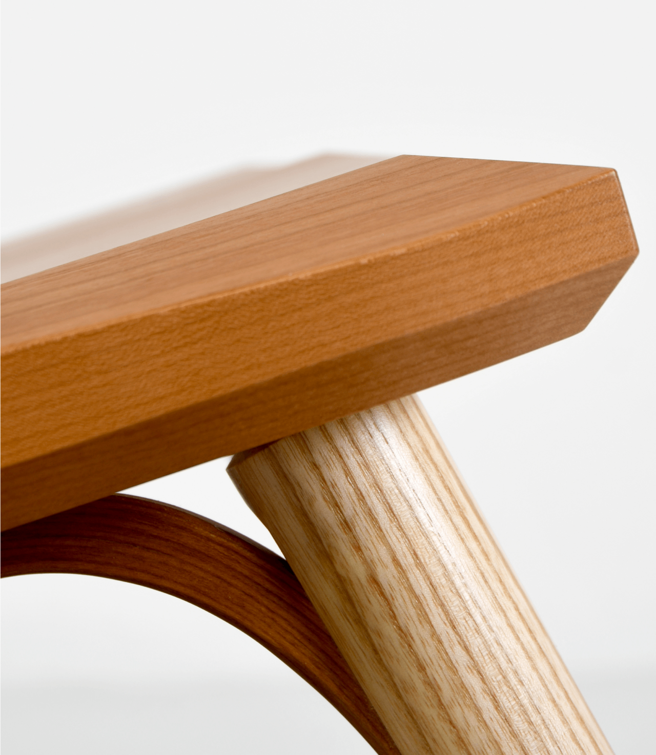 Detail of the Eastward Chair seat, knee, and leg.