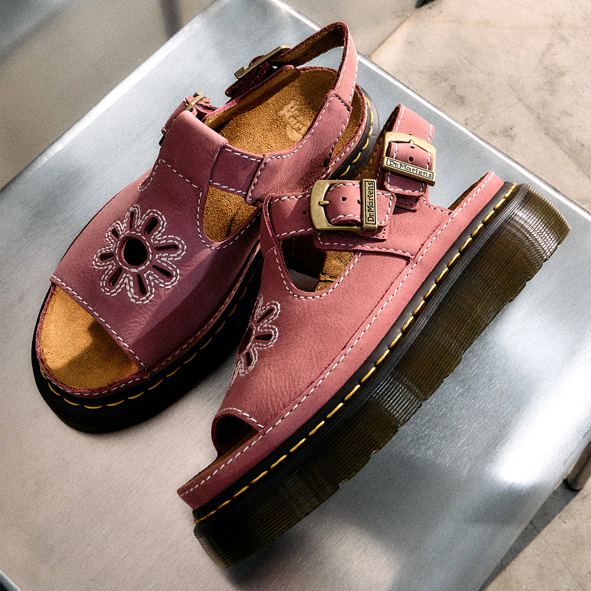 A pair of pink Dr Martens Dunnet Flower sandals