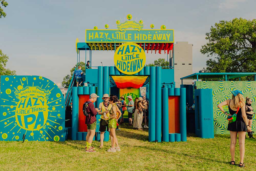 A crowd in front of the Hazy Little Hideaway