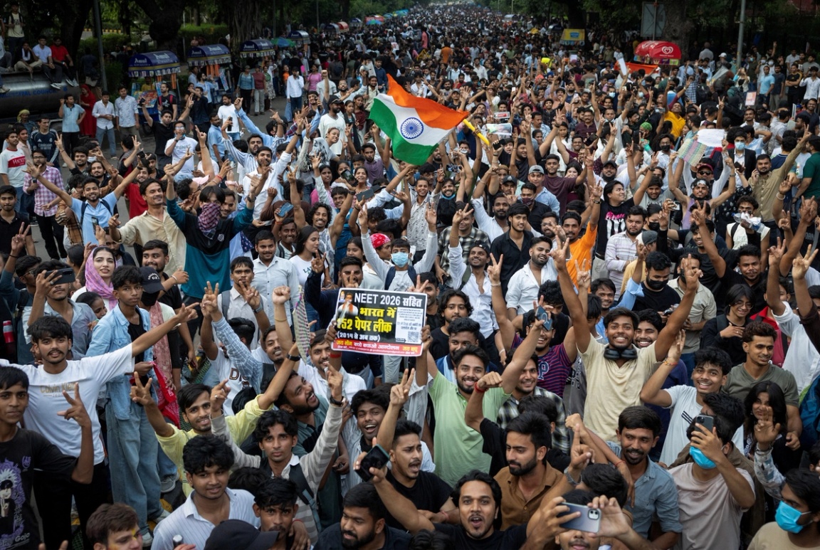 Supporters of India’s Cockroach Janta Party celebrate after India’s Education Minister Dharmendra Pradhan resigned