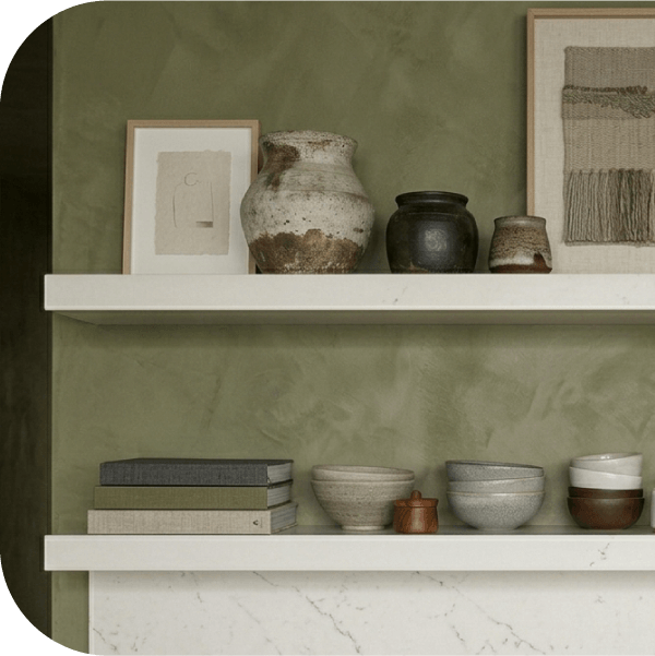Decorative shelves with pottery and frames.