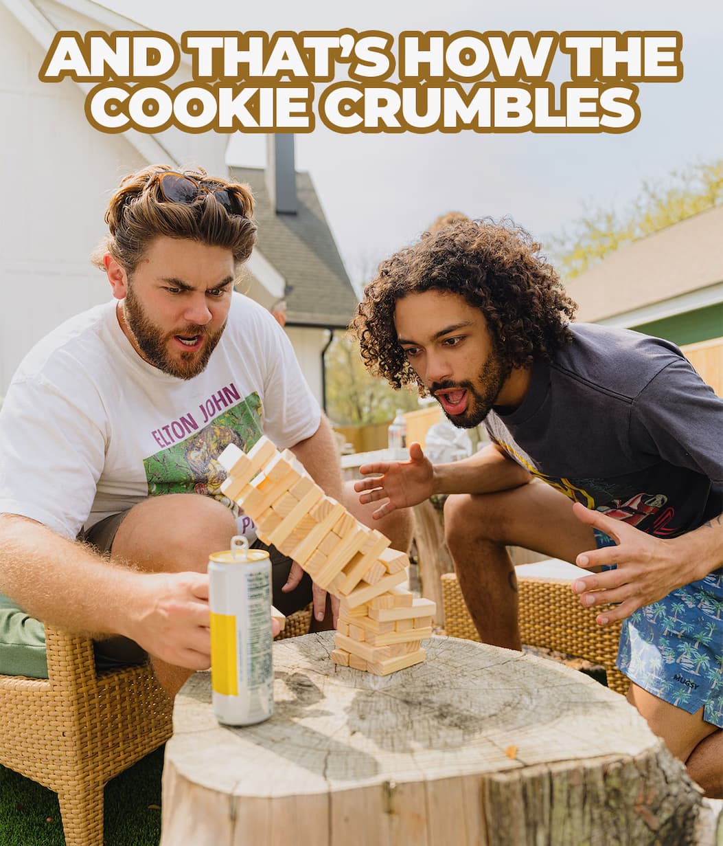 And thats how the cookie crumbles. Image of men playing jenga.