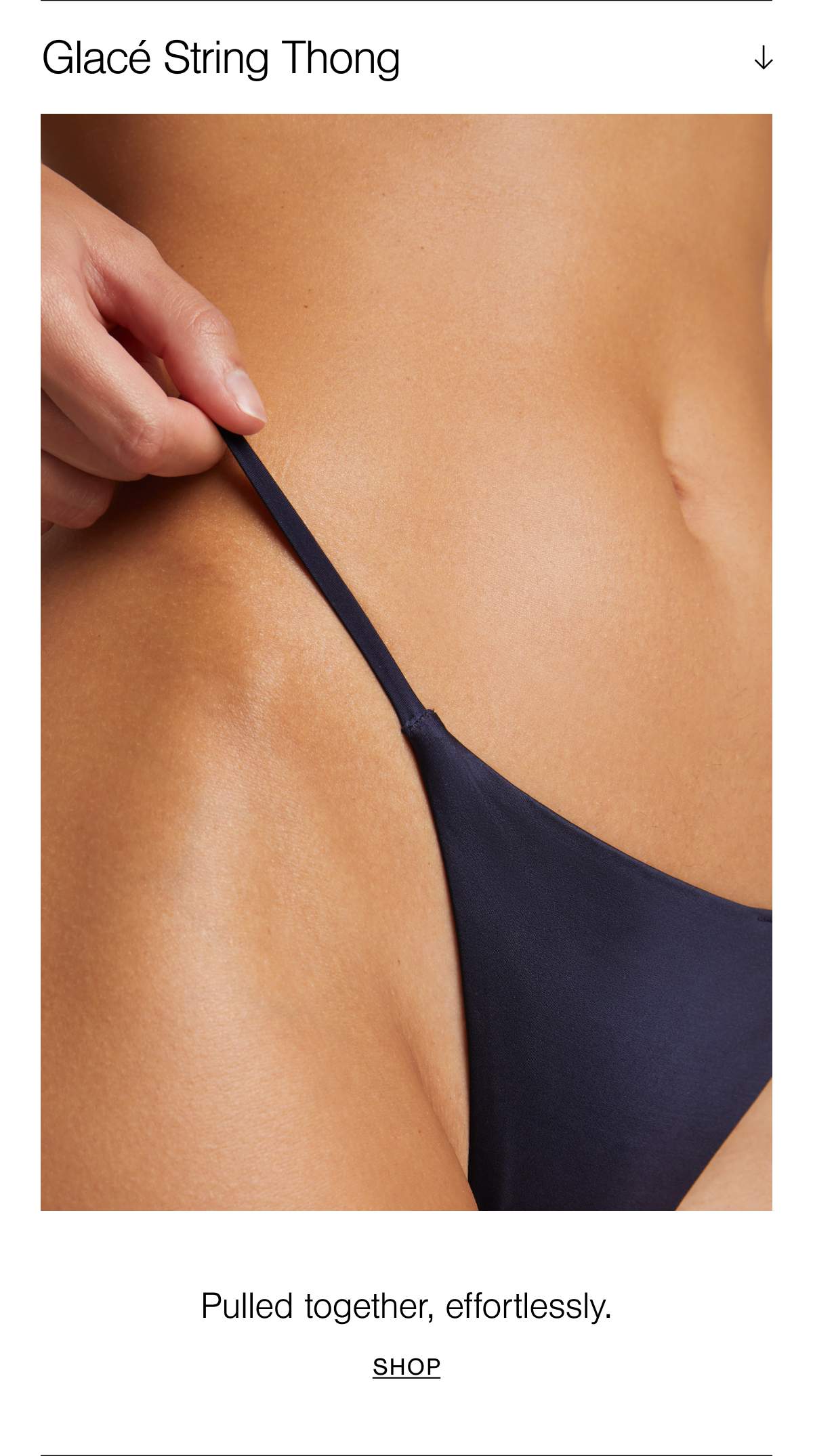 Model is wearing the Glacé String Thong in Navy. Our most minimal cut; seamless under anything and guaranteed to make you feel fancy.
