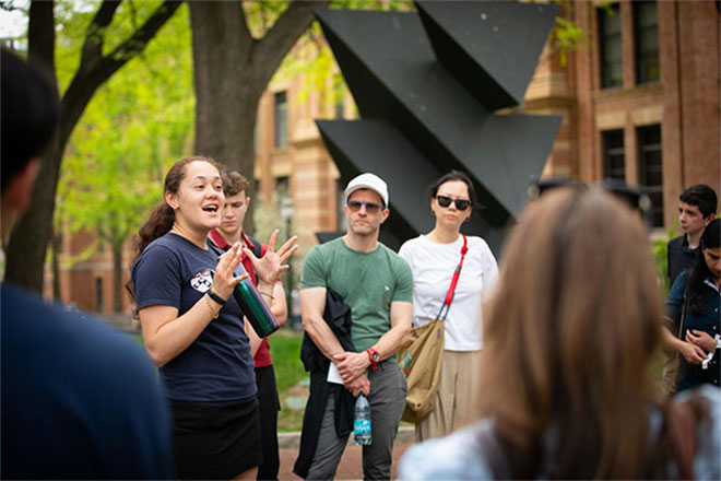 Gabrielle Fine, left, leads a Kite & Key campus tour for prospective students and their families. 