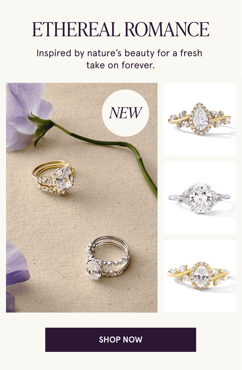 Two engagement rings next to a flower and three rings off to the side. New Ethereal romance. Click here to shop now