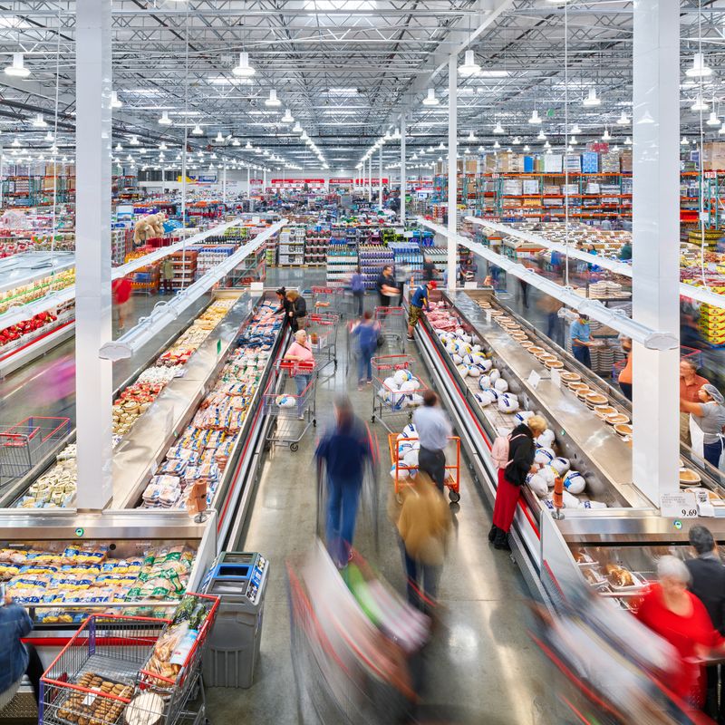 A busy shopping aisle in a store.