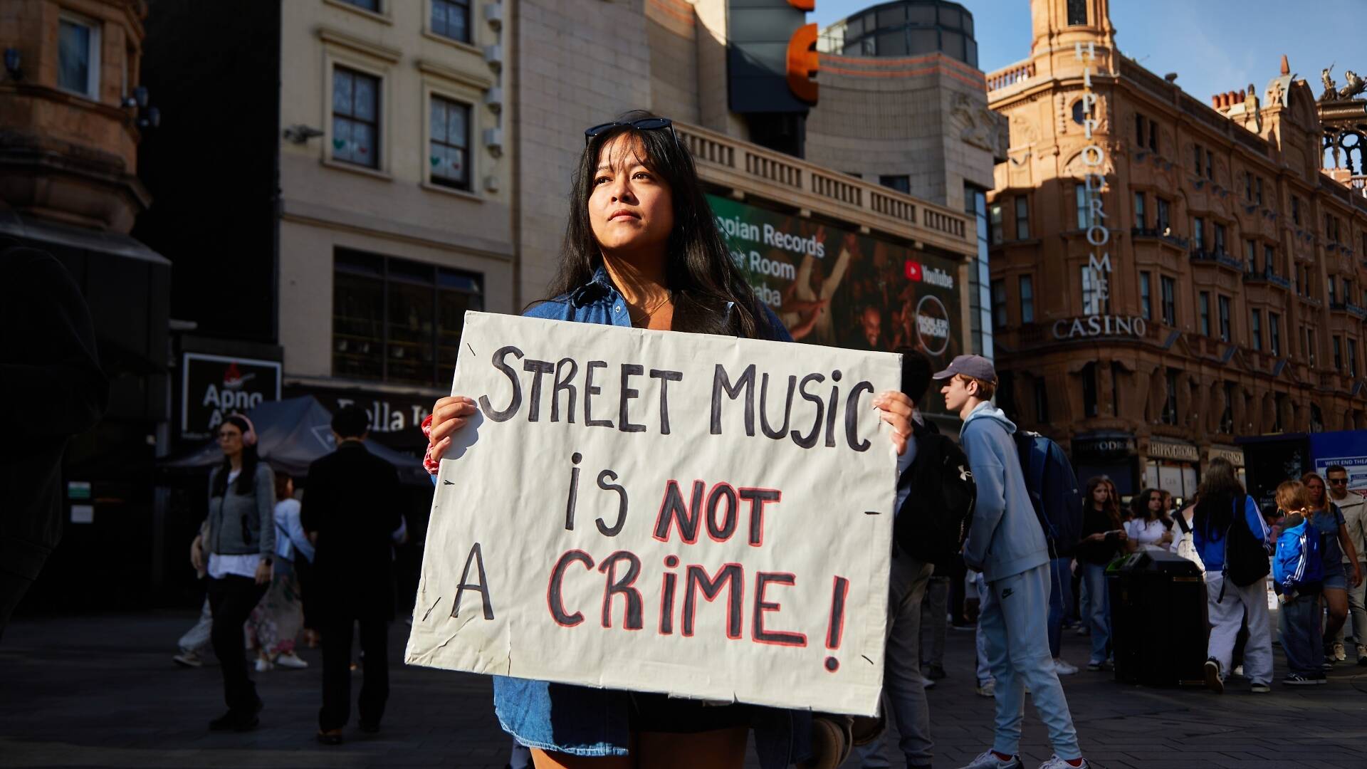 Busker Protesting