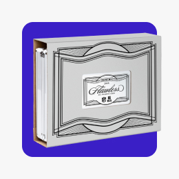 A 2025 Panini Flawless NFL card box against a blue tile.