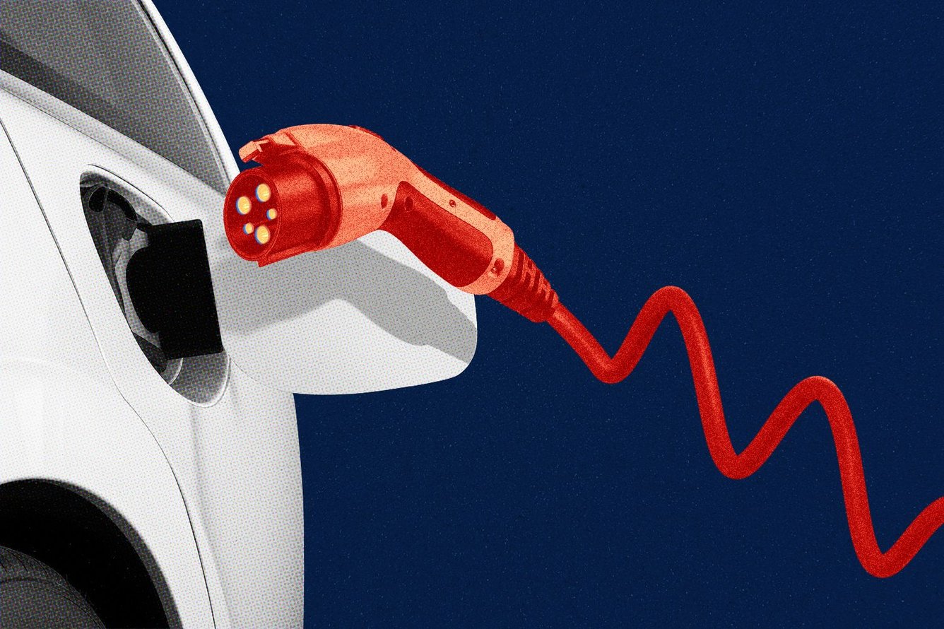 An electric vehicle charger resembling a downward market arrow hovering over a charging port