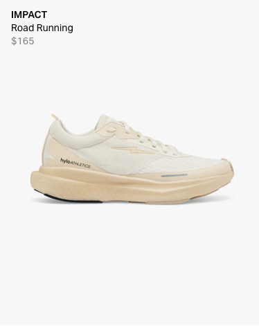 White and green shoes on top of shoe box