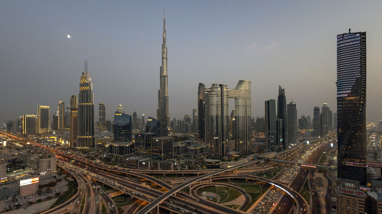 Traffic near the Burj Khalifa skyscraper, center, in Dubai, United Arab Emirates