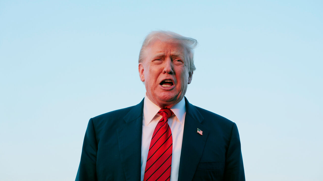 President Donald Trump speaks to reporters.