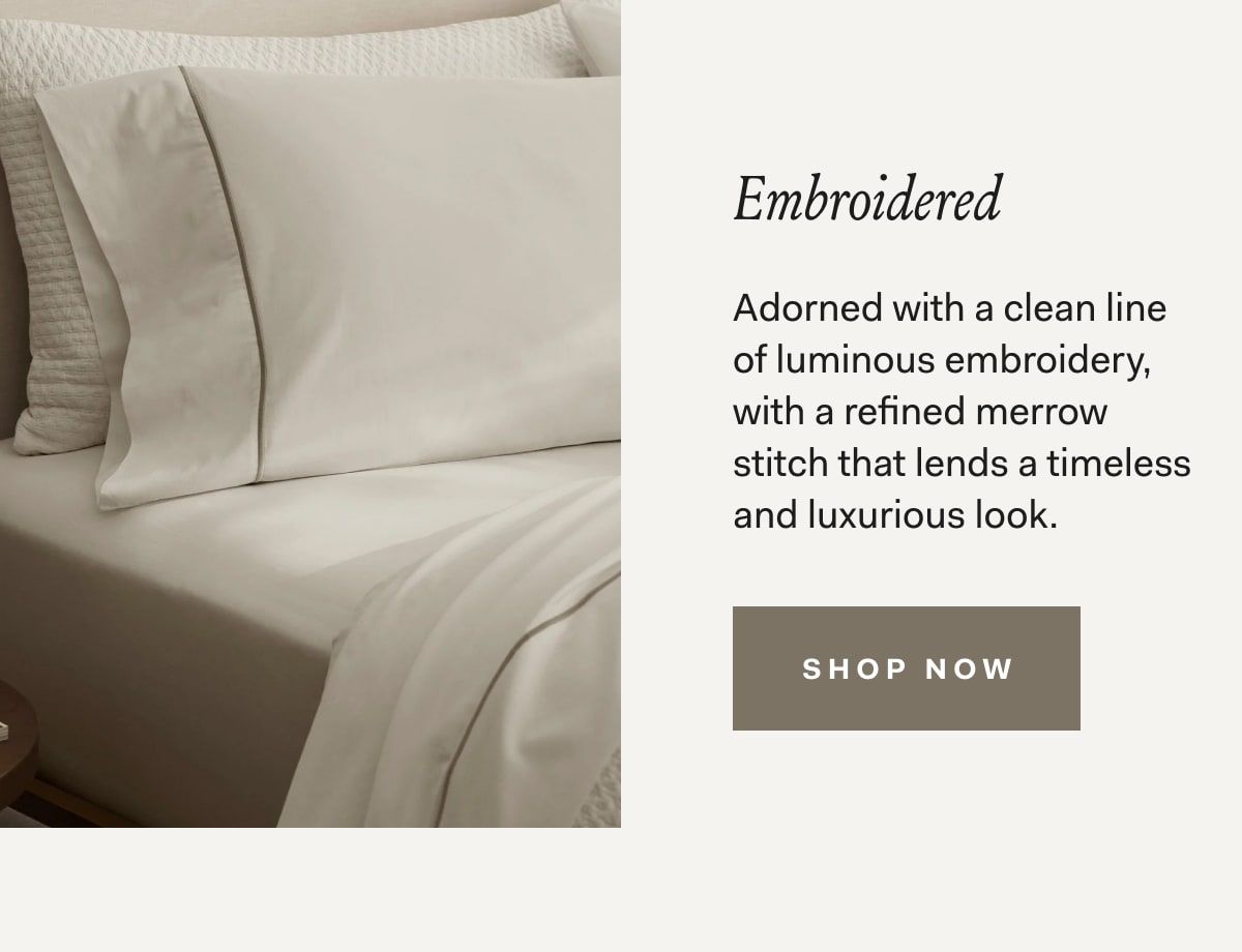 Embroidered Adorned with a clean line of luminous embroidery, with a refined merrow stitch that lends a timeless and luxurious look. 