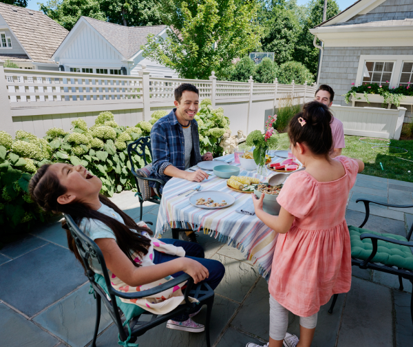 Family eating dinner outside