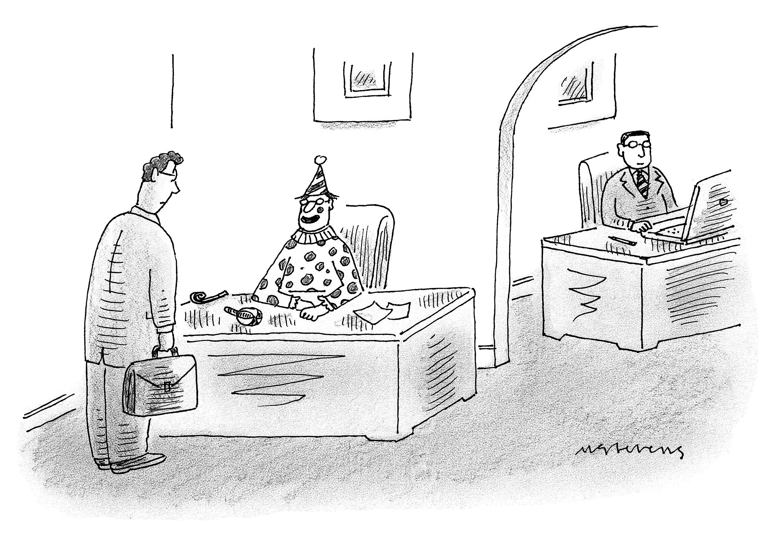 A clown sits at a receptionist desk, speaking with a person in a suit.