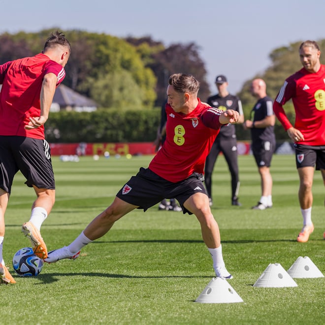 Players training with FORZA SuperCone training marker domes.