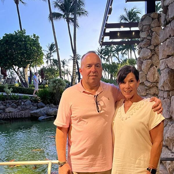 Michele Milso, pictured with her husband, Dan, is enrolled in a clinical trial led by Erica Mayer for a drug to halt the spread of metastatic breast cancer. While the experience has been challenging, Milso is grateful for the opportunity to contribute to research.