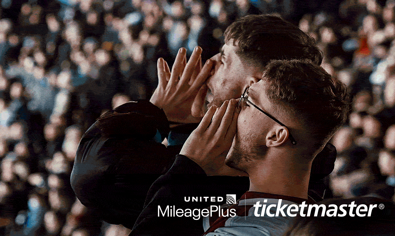 A crowd of fans cheering. A person sits on stage at a grand piano. A band on stage playing a concert. A woman performing.
