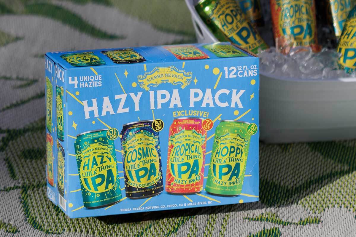 A Hazy IPA Pack next to an icy bucket full of beer cans