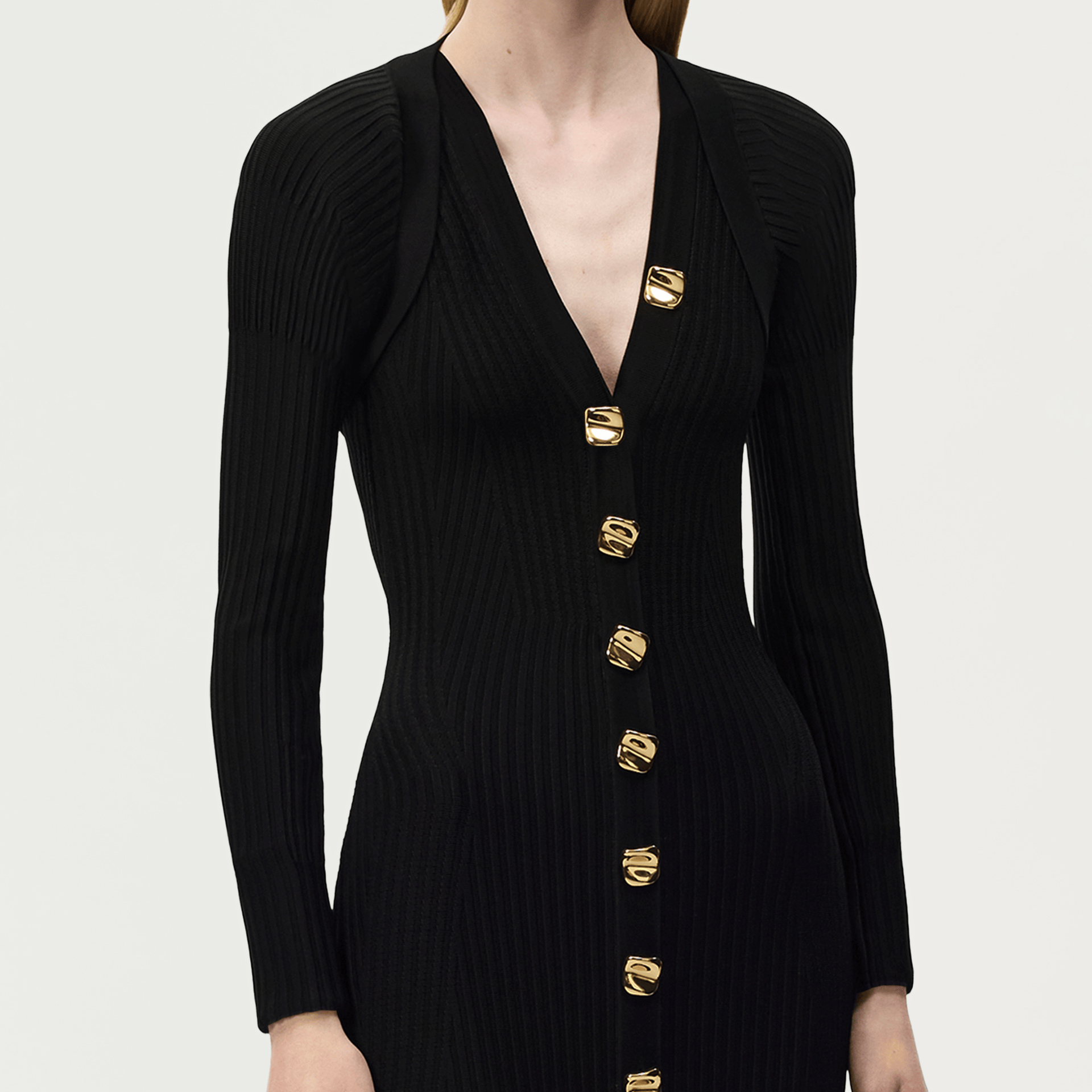Gif of a model wearing the safi shrug with the matching eliza dress