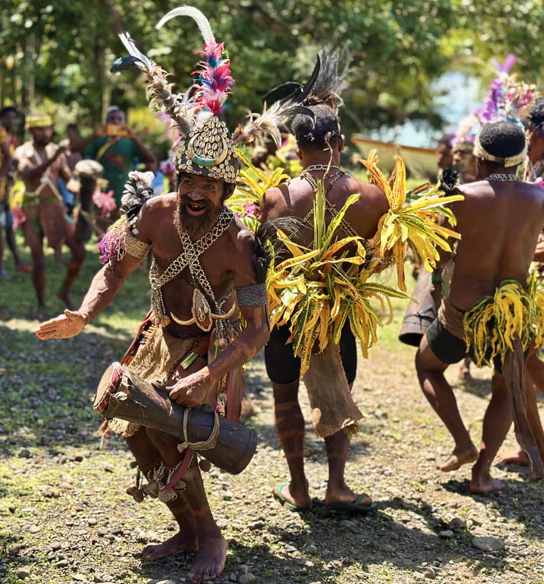 A musical performance given by Papua New Guineans at the cocoa trade expo. 