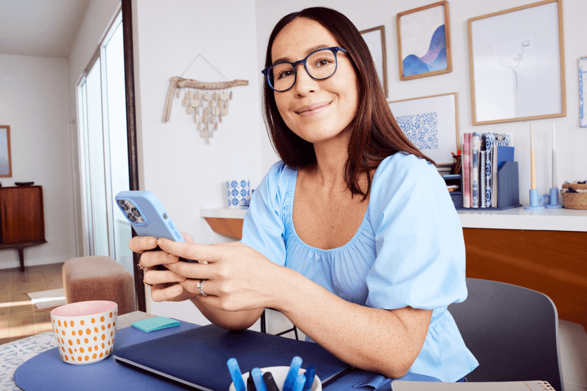 Woman using her iPhone