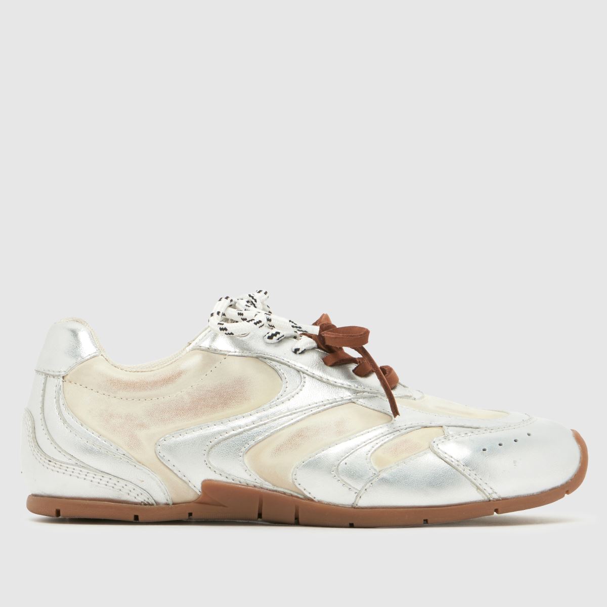 A silver schuh trainer