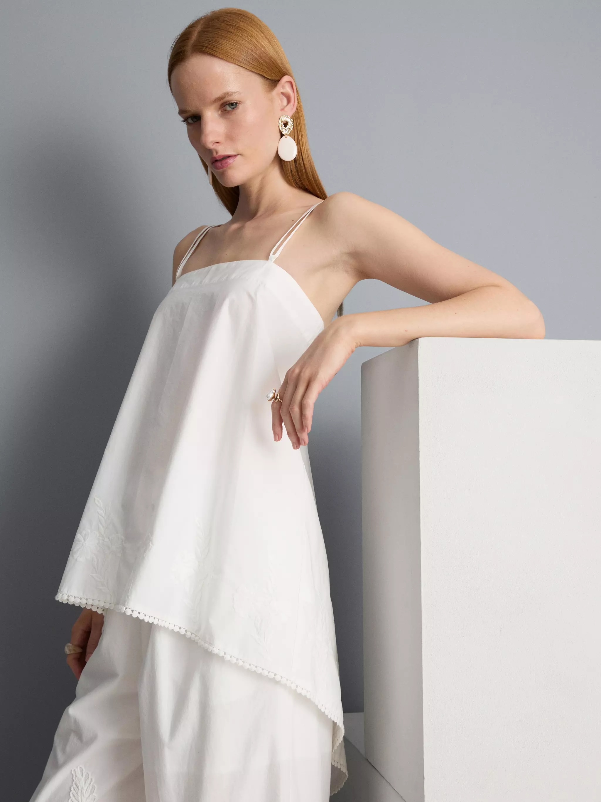 Woman wearing Cotton Hanky Hem Cami Top