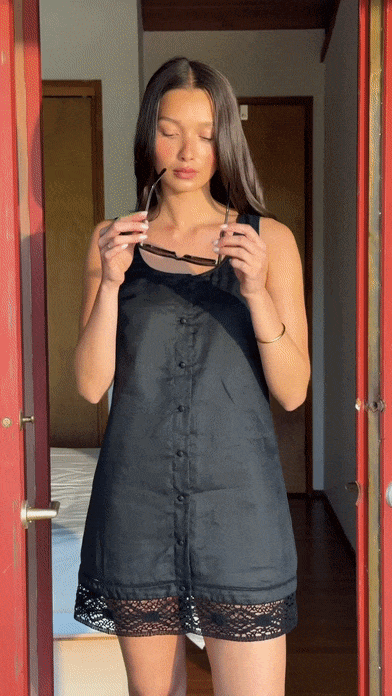 b'The model is wearing The Heirloom Dress in Black'