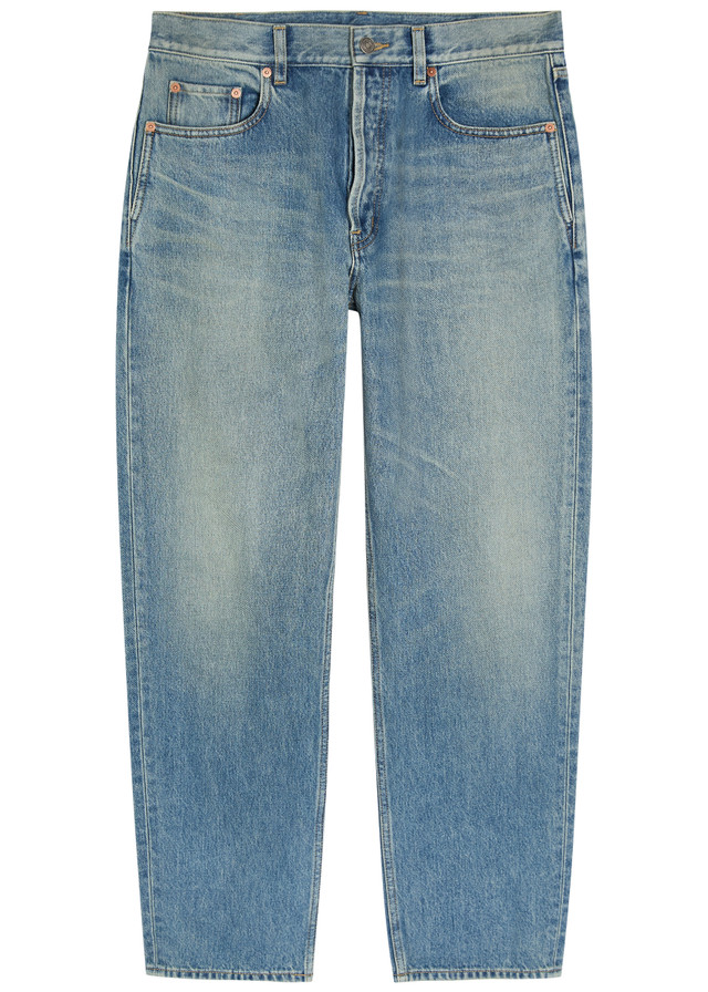 SAINT LAURENT Tapered-leg denim jeans