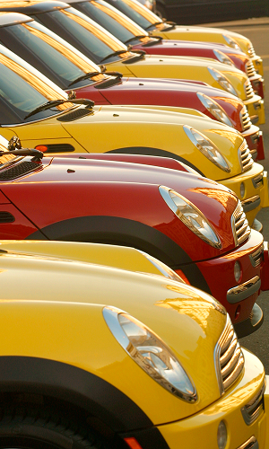 A row of red and yellow MINIs