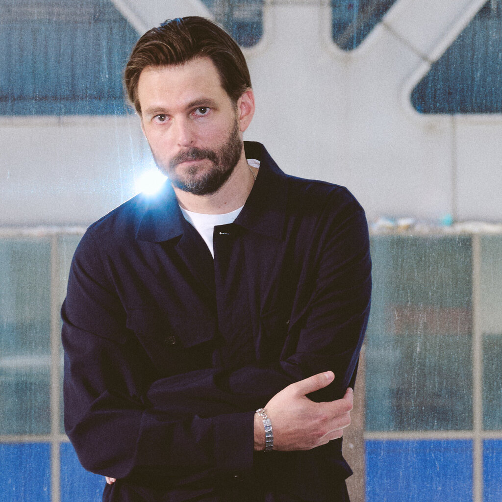Sam Levinson, wearing a blue shirt.