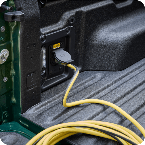 A close‑up view of a power outlet in the Ford Maverick&reg; truck&rsquo;s bed