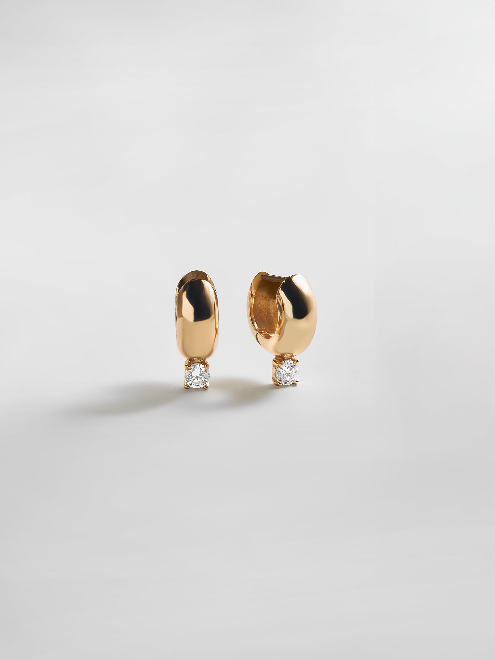 Image of Kourtney Huggie Earrings - Kourtney Gold Plated Brass Earrings
