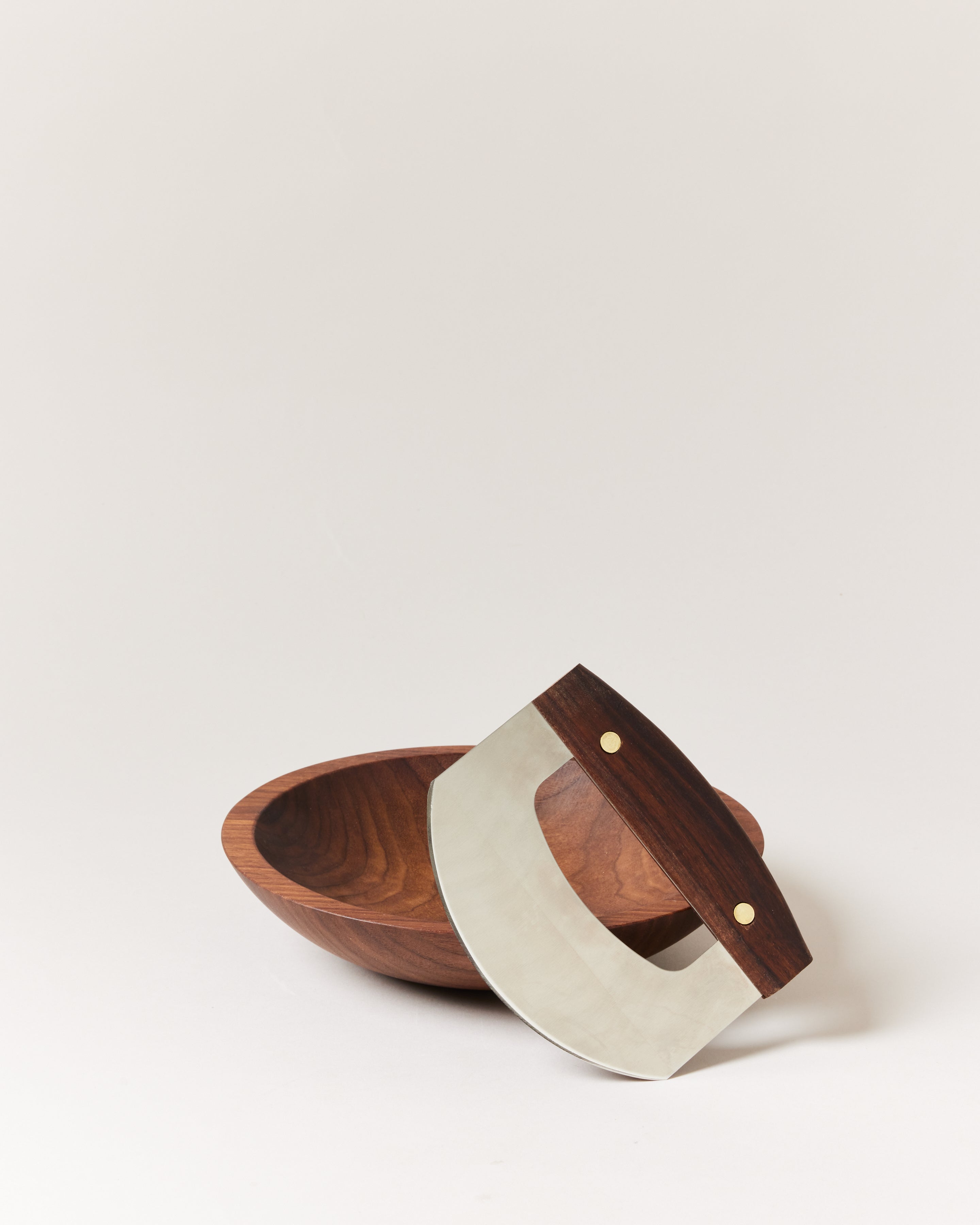 A handcrafted chopping bowl with mezzaluna