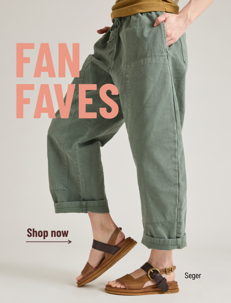 an image of a person wearing sandals and a tan shirt