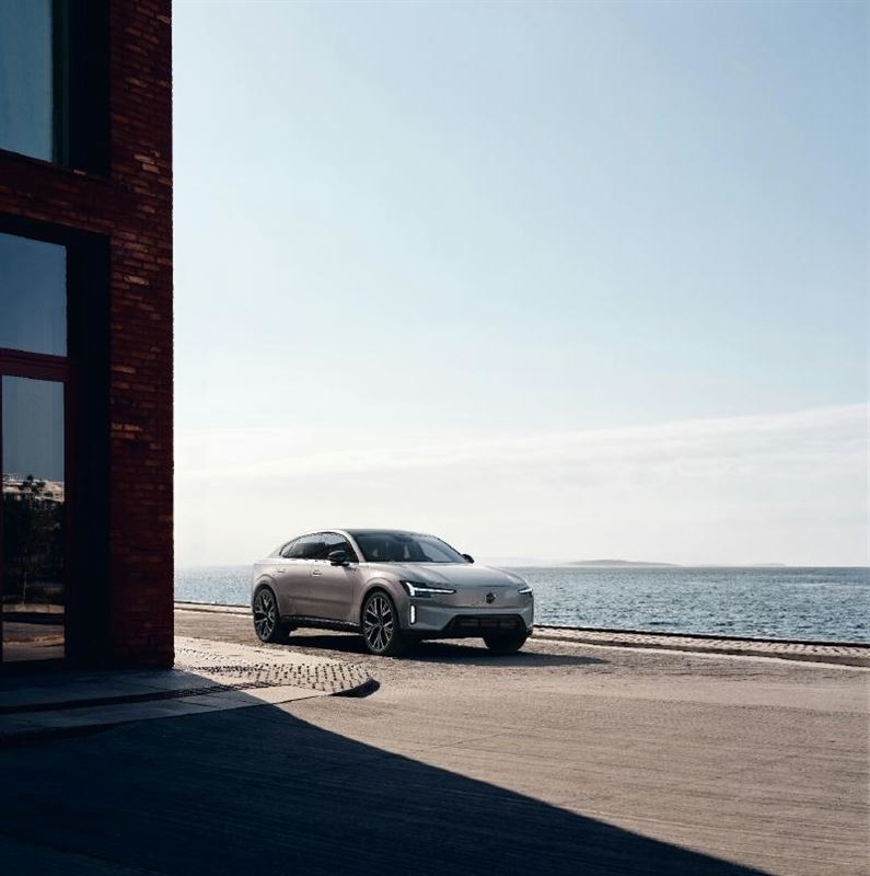 A car parked on the side of a road near a building

AI-generated content may be incorrect.