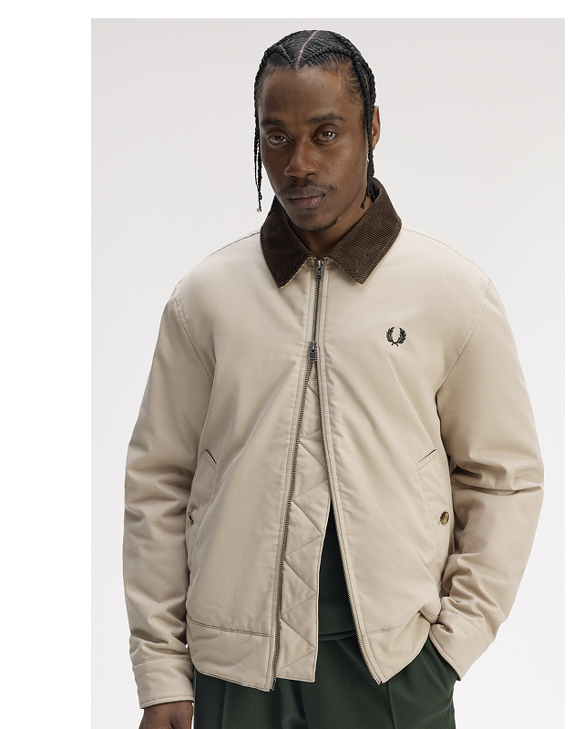 Male model wearing a Fred Perry Caban Jacket in Warm Oat