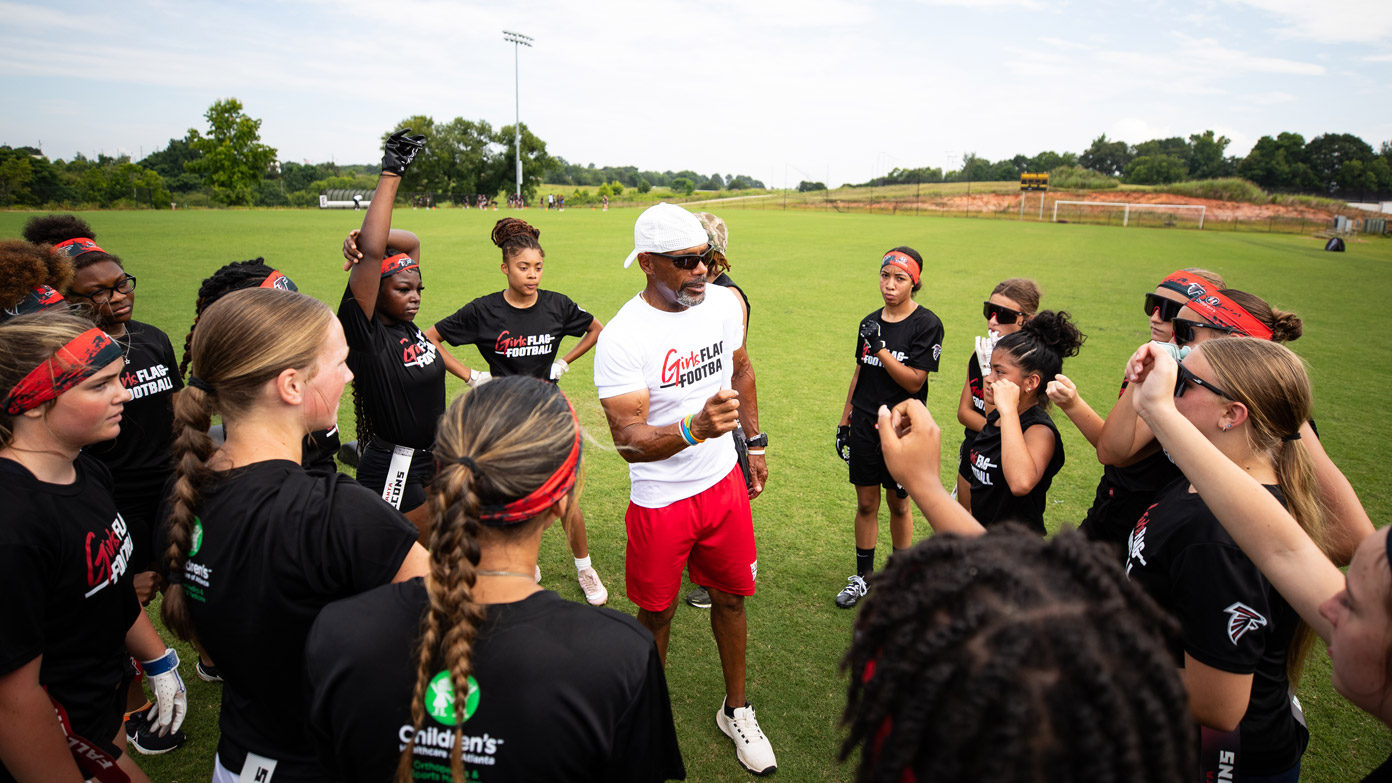 Girls prepare for Girls Flag Football Camp
