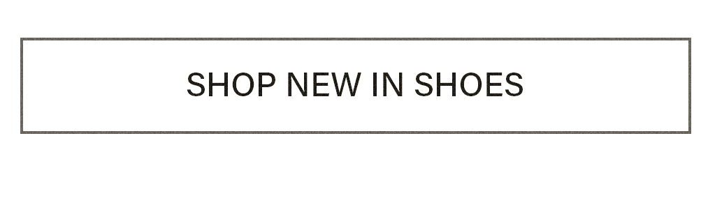 White rectangular button with "SHOP NEW IN SHOES" text in black within a subtle grey outline. Explore our exciting new shoe arrivals.