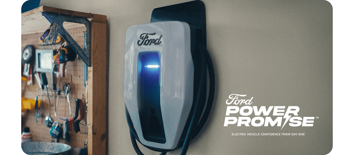 An installed home charger with the Ford Power Promise logo in lower right corner.
