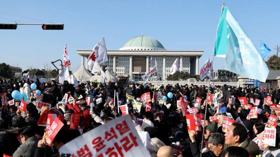 SEOUL, SOUTH KOREA - DECEMBER 14: Protesters call for the impeachment of South Korean President Yoon Suk Yeol in front of National Assembly on Dec. 14, 2024 in Seoul, South Korea. (Photo by Han Myung-Gu/Getty Images)
