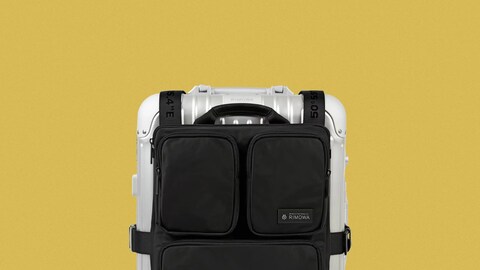 Did a Travel Icon Just Invent the Ultimate Bag for Hardshell Luggage Fans?