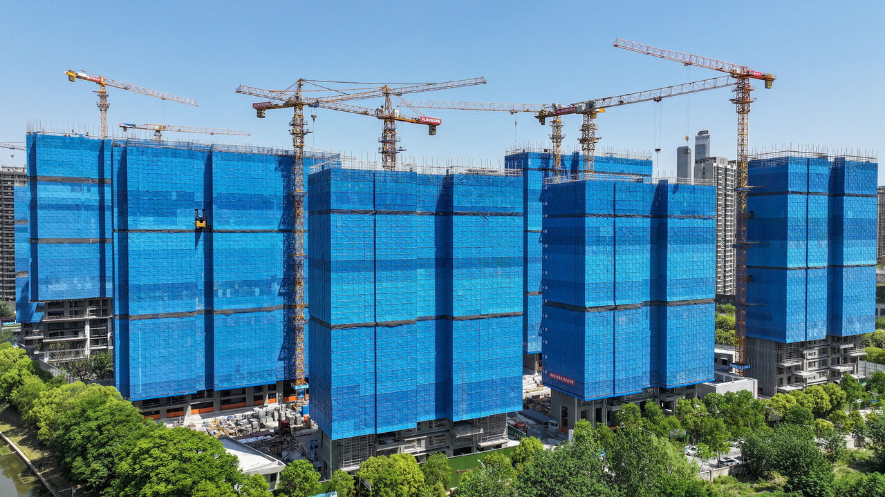 : Aerial view of residential housing project under construction on April 25, 2025 in Nanjing, Jiangsu Province of China.
