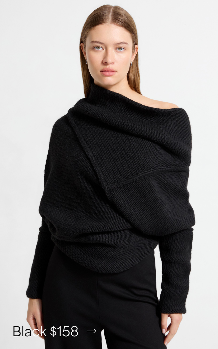 Bianca poses in the black Palmer Long Sleeve Top, priced at $158 →.