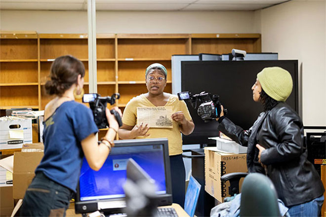 Student filmmakers Harper Prentice and Hosaena Tilahun interviewed Alisha Davis, a former history teacher who has served as the Free Library of Philadelphia’s Hyperlocal Heritage archivist since August 2025.