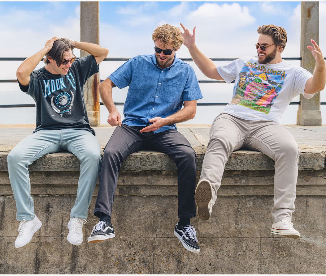 [IMG of men sitting in jeans, surprised at the stretch]