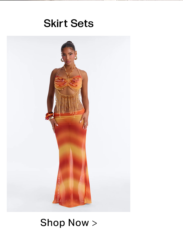 Gradient orange-yellow mesh maxi skirt set with a beaded halter top and gold fringe, modeled by a woman, showcasing the latest skirt sets.